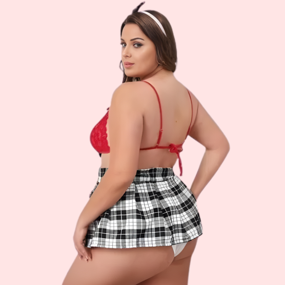 Red bikini top and black and white checkered shorts.