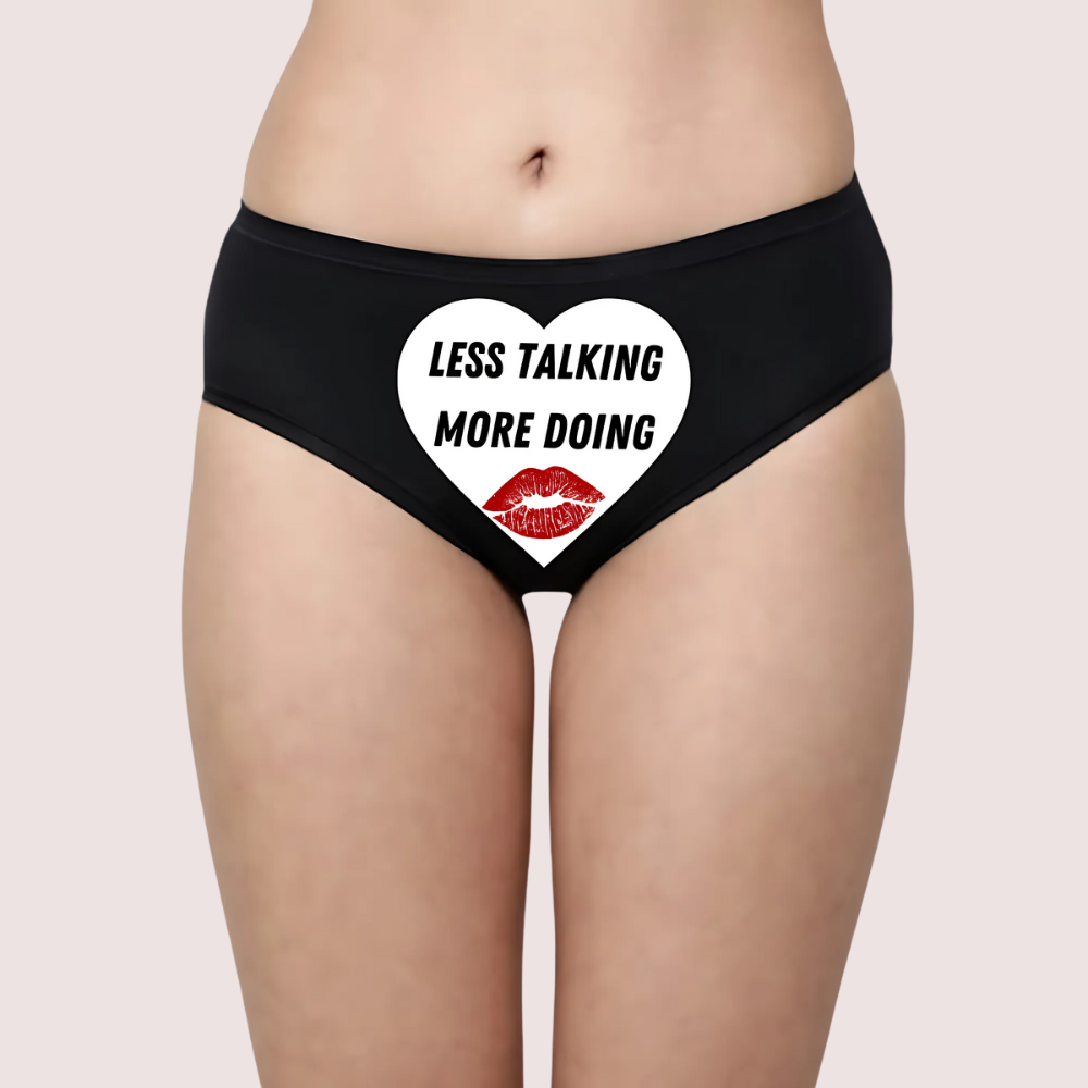 Black underwear with a heart design and 'LESS TALKING MORE DOING' text. Naughty Quotes Printed Panties. Sensual Custom Text Get Things Done Panty.