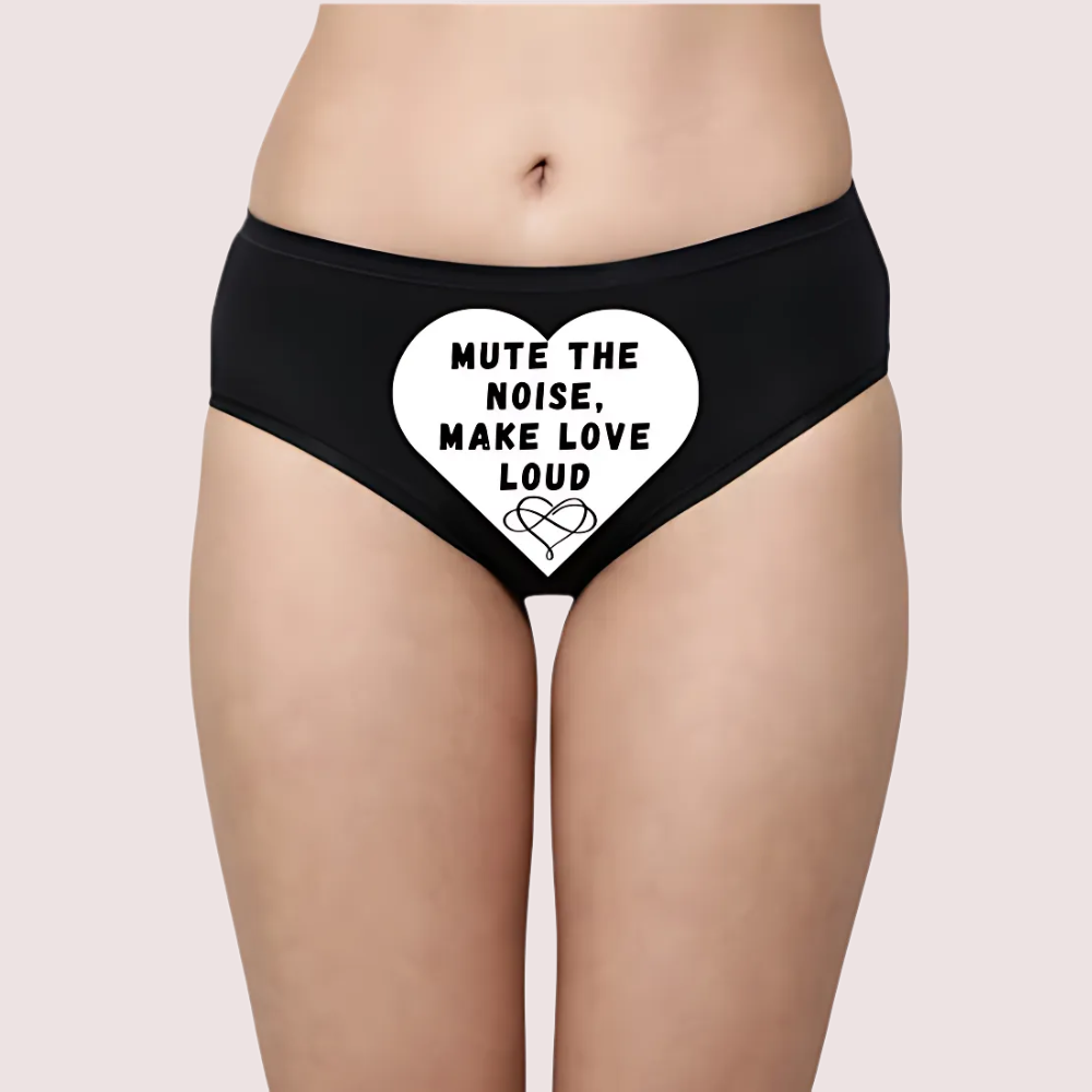 Black underwear with a heart-shaped design and 'MUTE THE NOISE MAKE LOVE LOUD' text. Subtle Seduction Personalized Naughty Panty